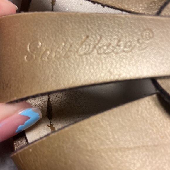 Used gold salt water sandles a little worn out but still cute and colorful. - Picture 2 of 8